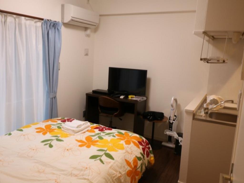 Aparthotel Mr. Kinjo In Makishi Naha Zimmer foto